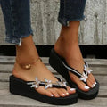 Women's butterfly slippers outdoor thong sandals in beige artificial PU with herringbone toe design, flat sole