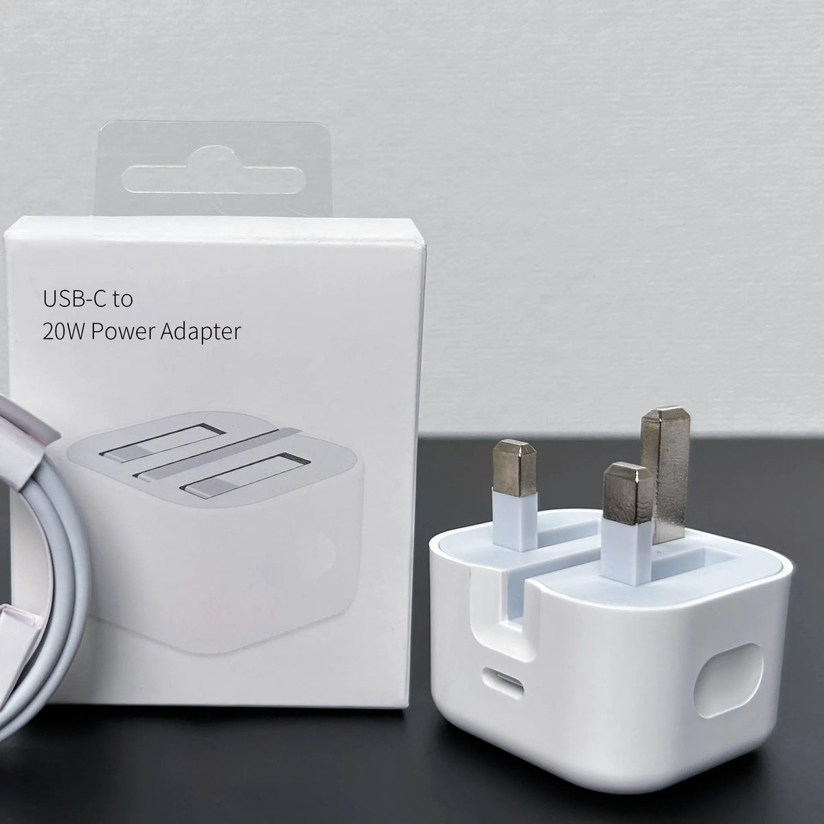 White 20W PD charger with USB-C port and international plug adapters