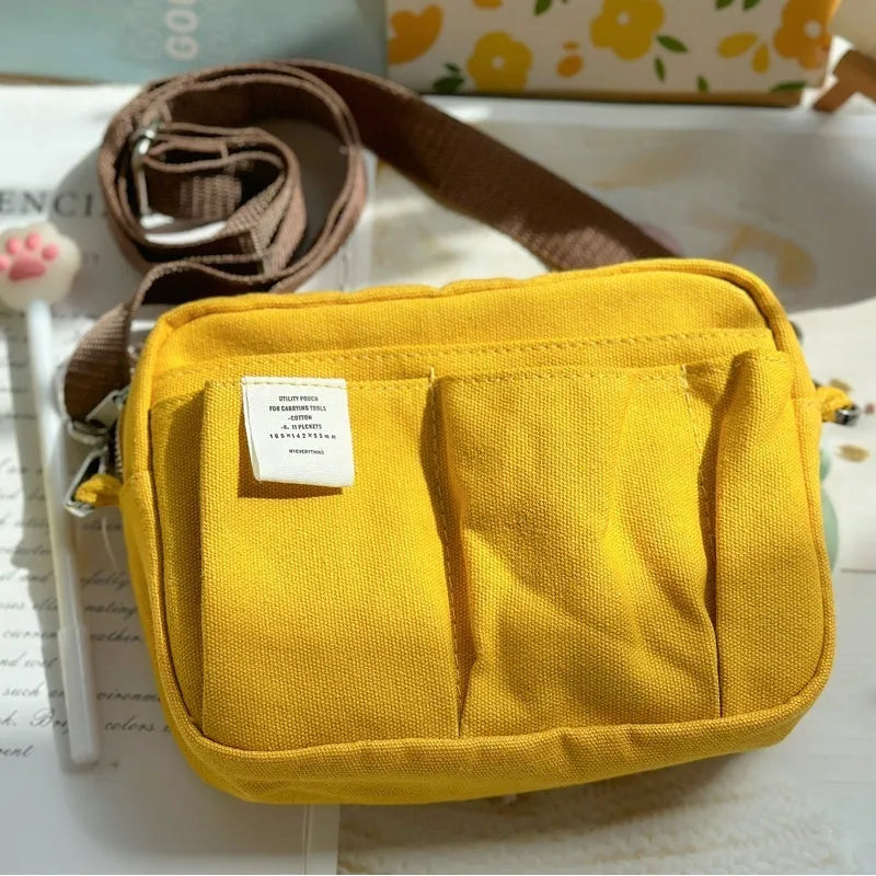 Canvas hand account storage bag in ginger yellow with shoulder strap, Korean style, large capacity