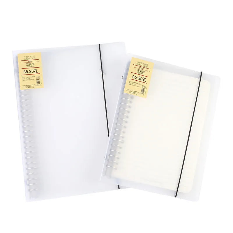 A5 loose-leaf notebook with 26-hole binder system showing horizontal line ruling on paper