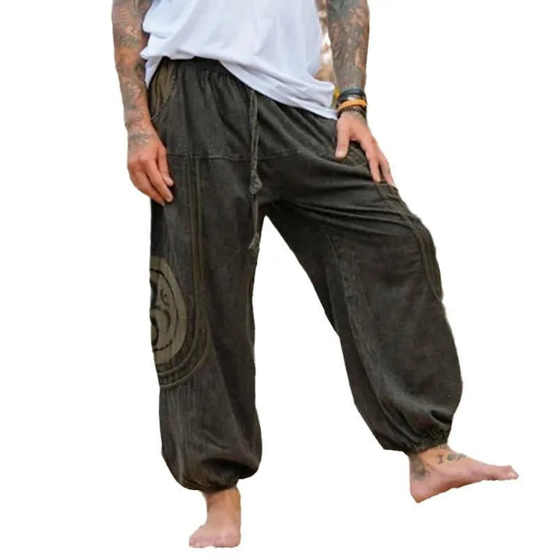 Dark green men's casual trousers with ethnic pattern and ankle-tied closure