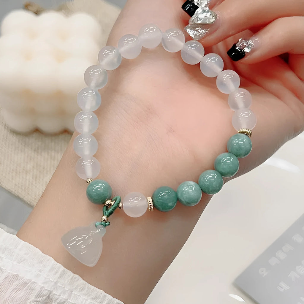 Women's retro Chinese style agate bracelet with carved lotus seedpod design