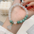 Women's retro Chinese style agate bracelet with carved lotus seedpod design