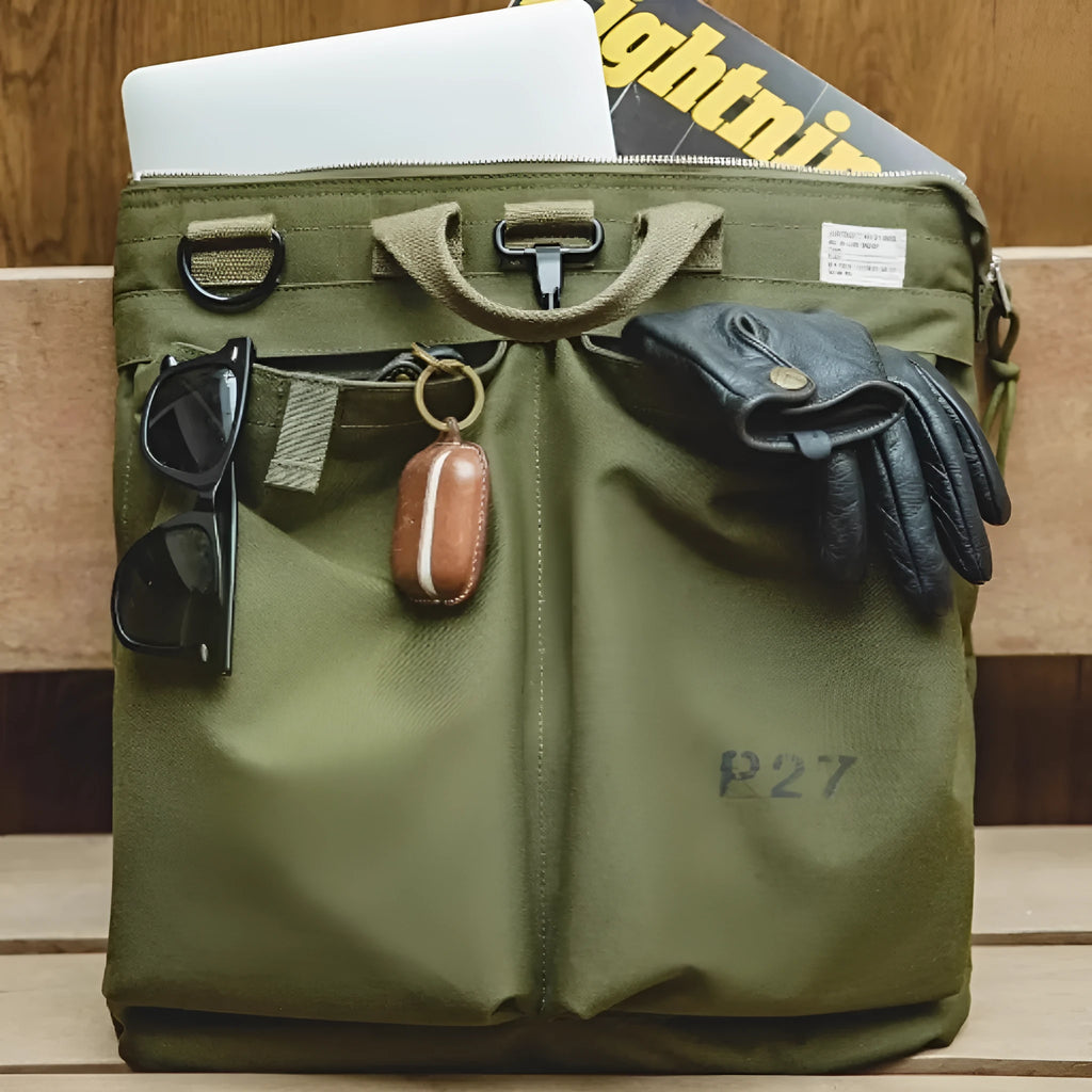 Canvas crossbody messenger bag in retro style showing military green colour with shoulder strap