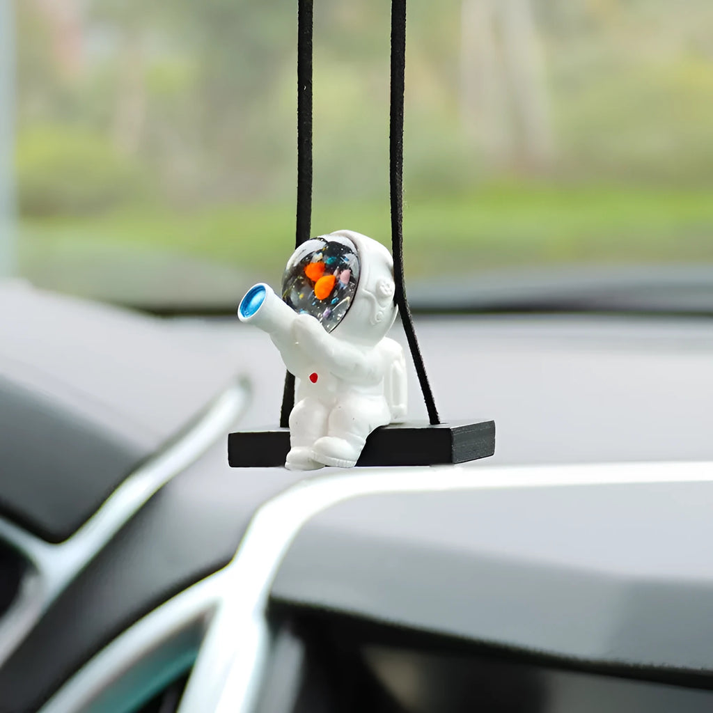 Resin astronaut car pendant with red flag, telescope, and radish designs