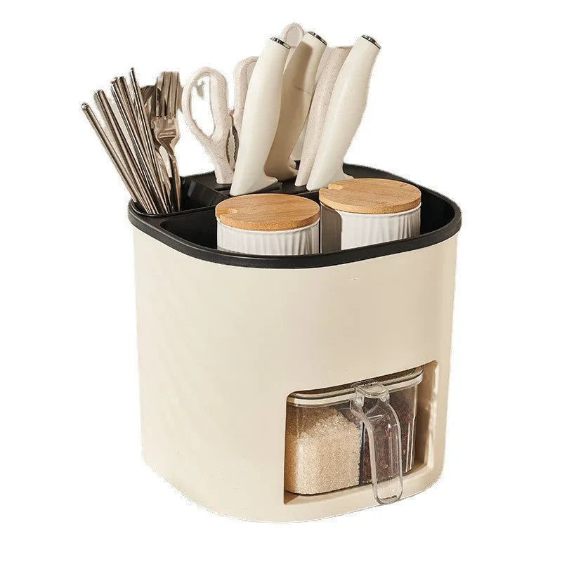 Rotating kitchen storage organiser with four compartments for cutlery and spices