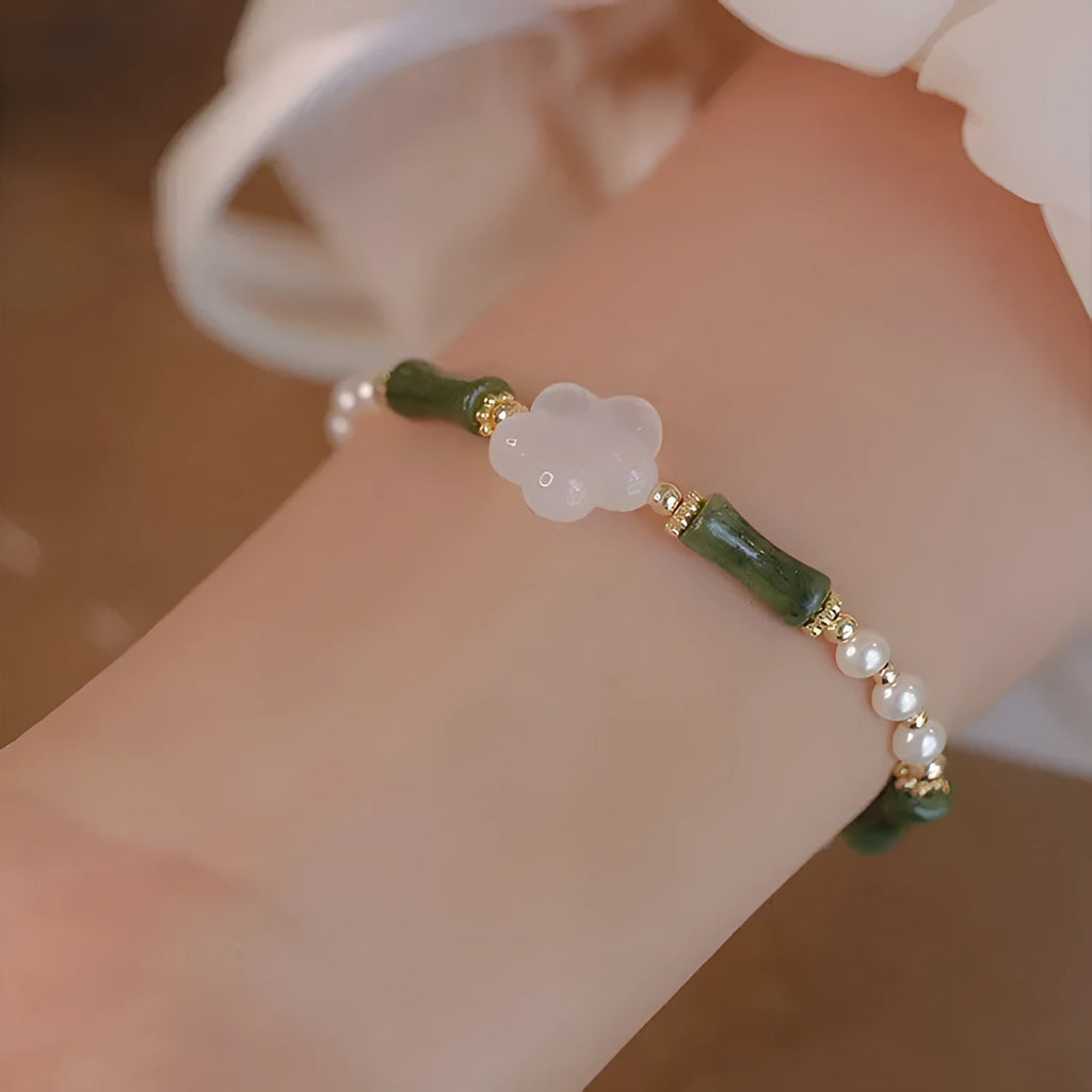 Chinese style olivine bamboo joint bracelet with Hetian jade and copper shell pearls on wrist