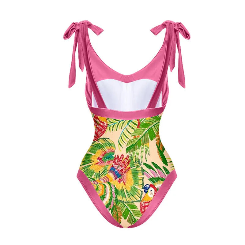 Retro pink floral print one-piece swimsuit with V-neck, thin skirt, and covered belly design.