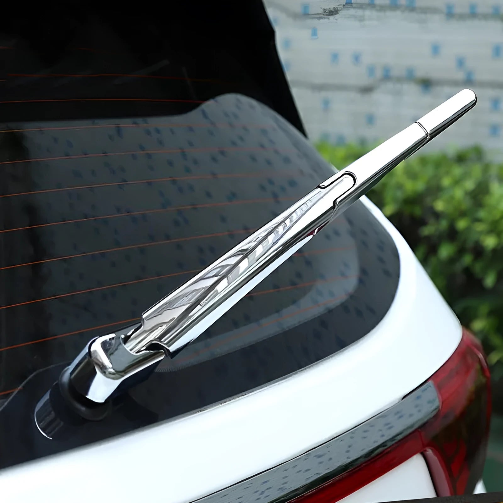 Silvery ABS plastic rear wiper cover trim for a 2010 Hyundai car.