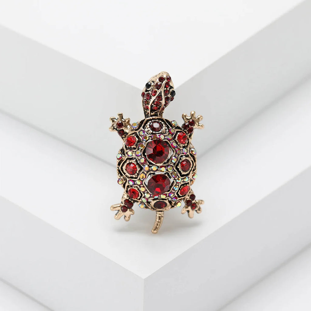 Alloy turtle brooch with rhinestone decoration in green, blue, or red colour options