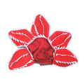 Dog wearing Halloween demon chomper costume with scary headband and fabric flower decoration