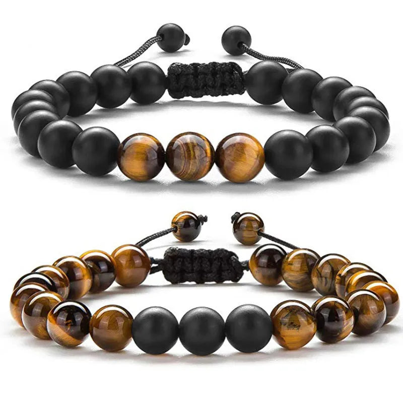 Matte black agate geometric bead couple bracelets on a white background.