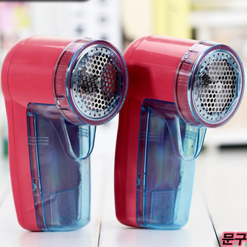 Portable electric lint remover with compact handheld design measuring 11cm for removing clothing pills