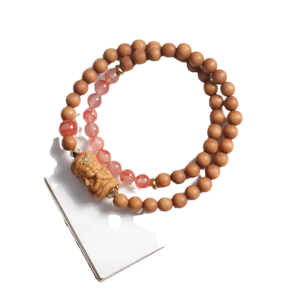 Brown sandalwood bracelet with 6mm round beads in double circle woven design