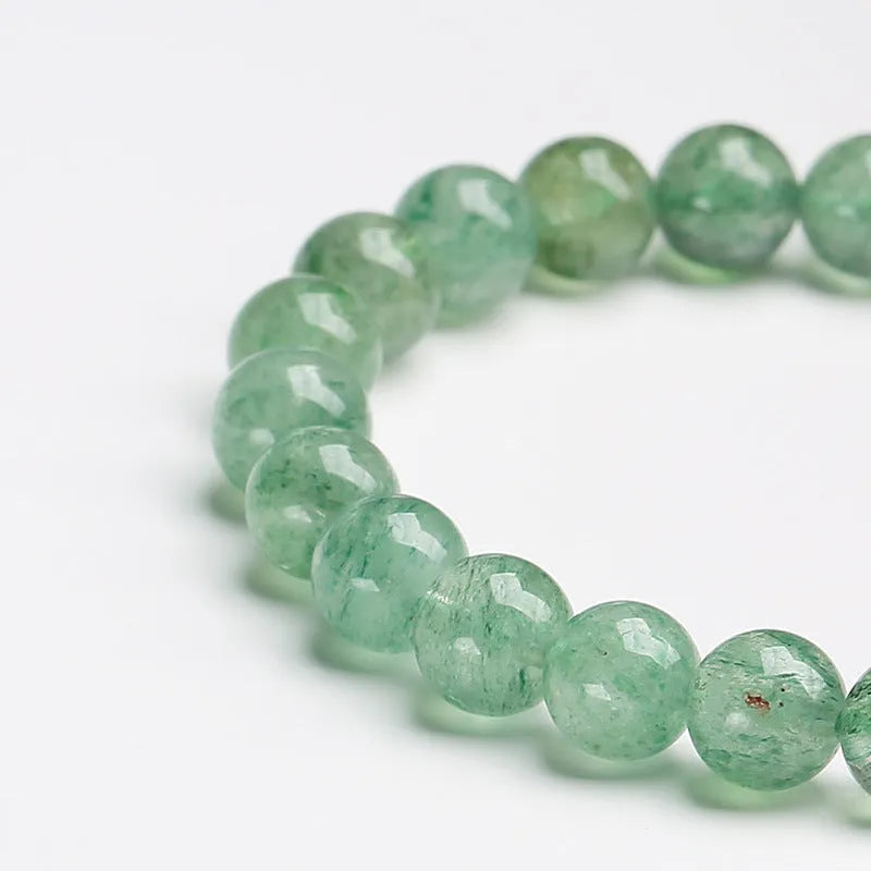 Green strawberry quartz Chinese style bracelet with 7.5mm beads and geometric hand-woven patterns