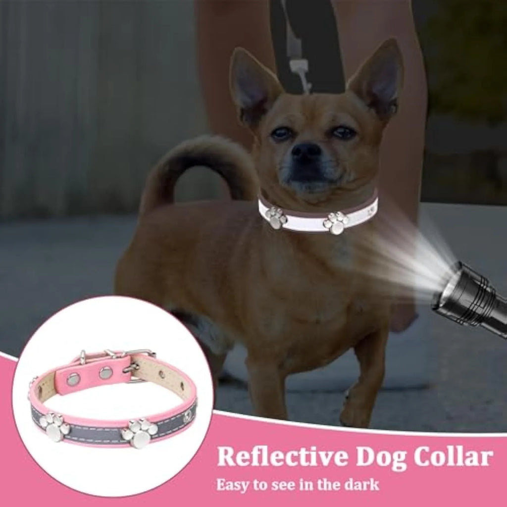 Reflective adjustable PU leather dog collar with metal paw rivet on a grey background.