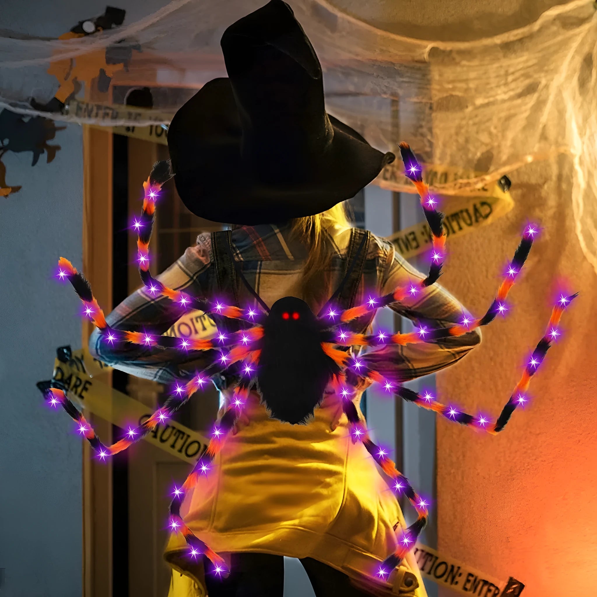 Halloween spider backpack with LED lights in plush sugar bag design, shown in multiple colour options.