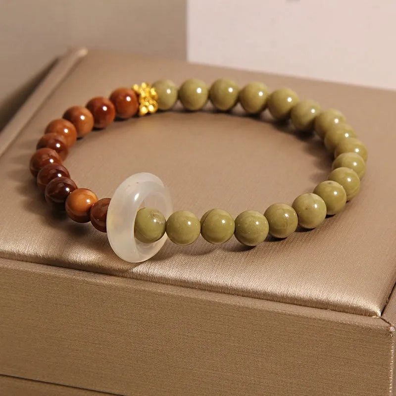 Green gradient Chinese style women's bracelet with crown and diamond motifs
