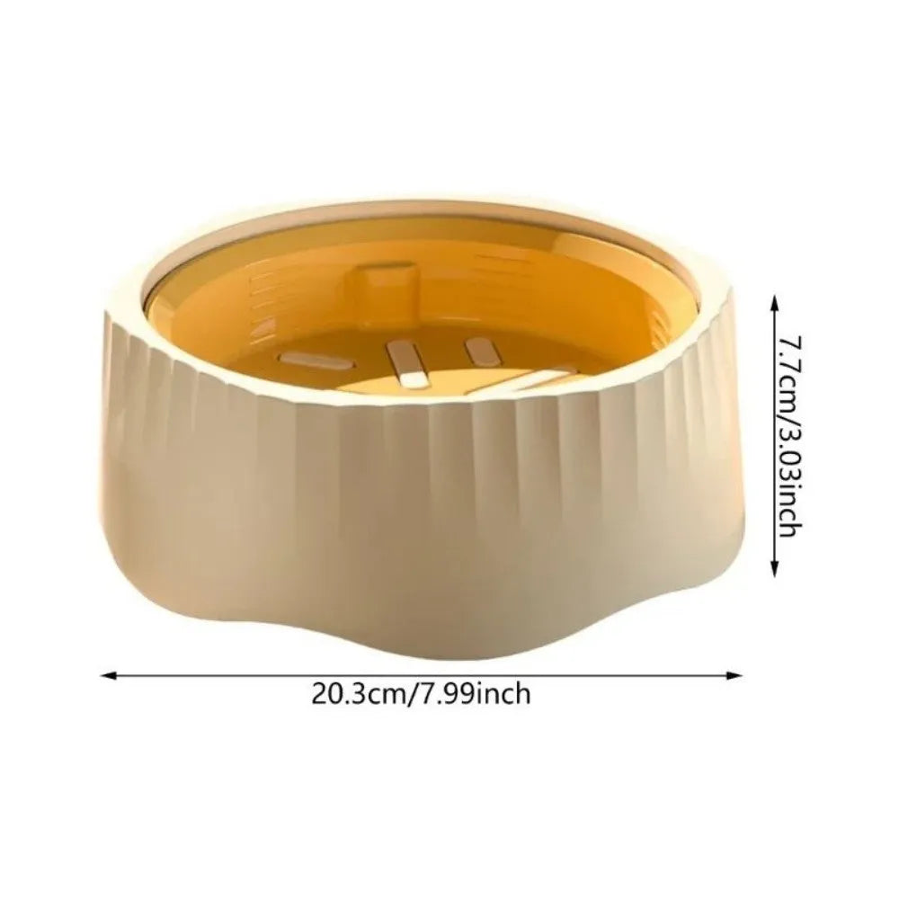 Blue plastic slow feeder dog bowl with detachable maze interior on a wooden floor.