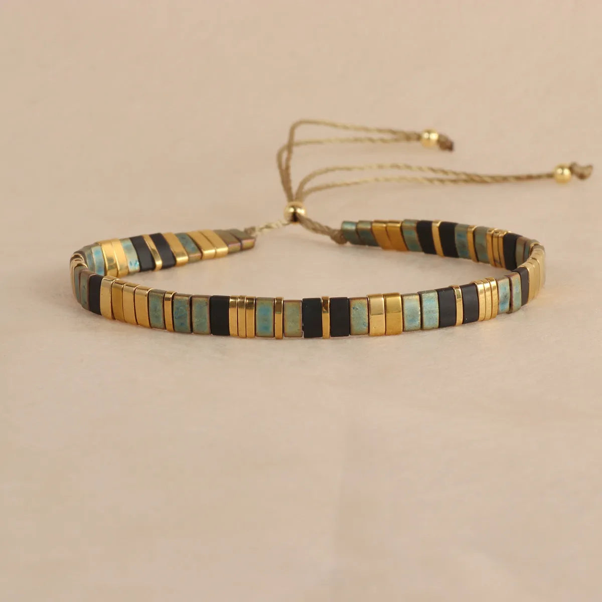 Geometric glass beaded bracelet with pull beads in five colour options