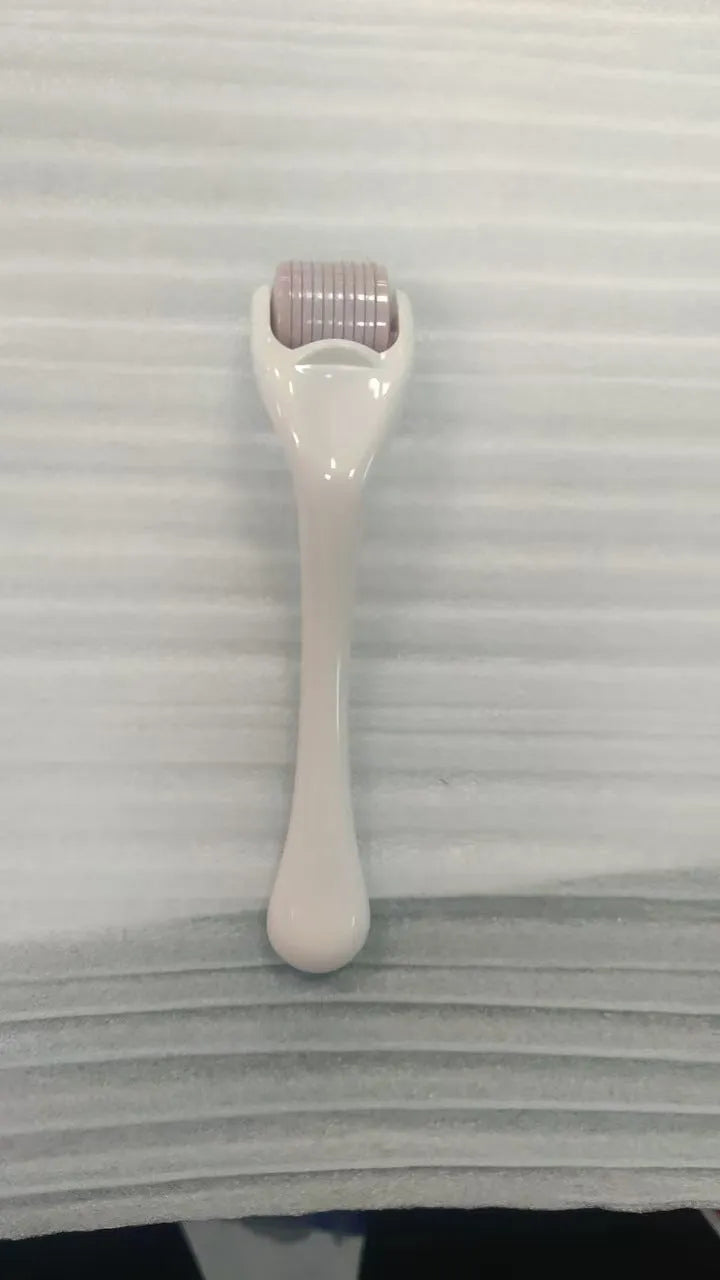 540 needle micro needle roller derma roller with black handle and purple wheel