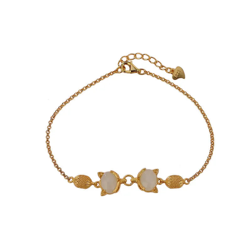 Women's 925 silver bracelet with a retro fox charm and a rectangular stone centrepiece on an adjustable chain.