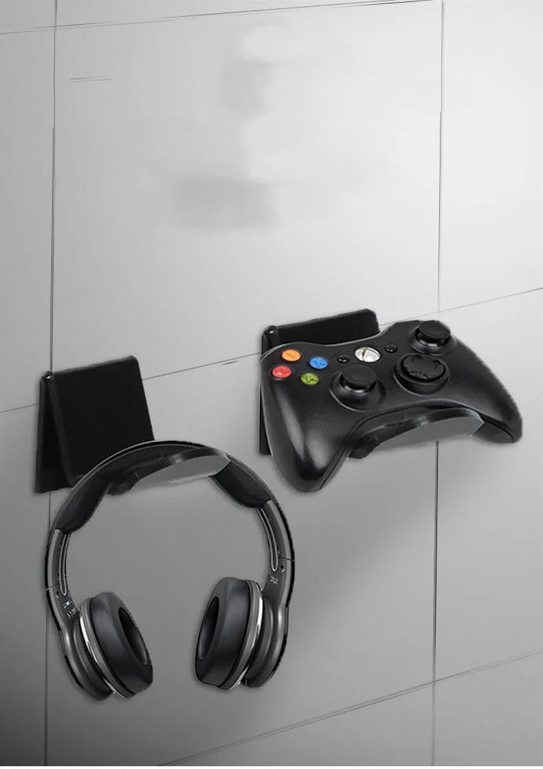 Universal gaming controller wall mounting bracket shown in black, white and transparent colour options