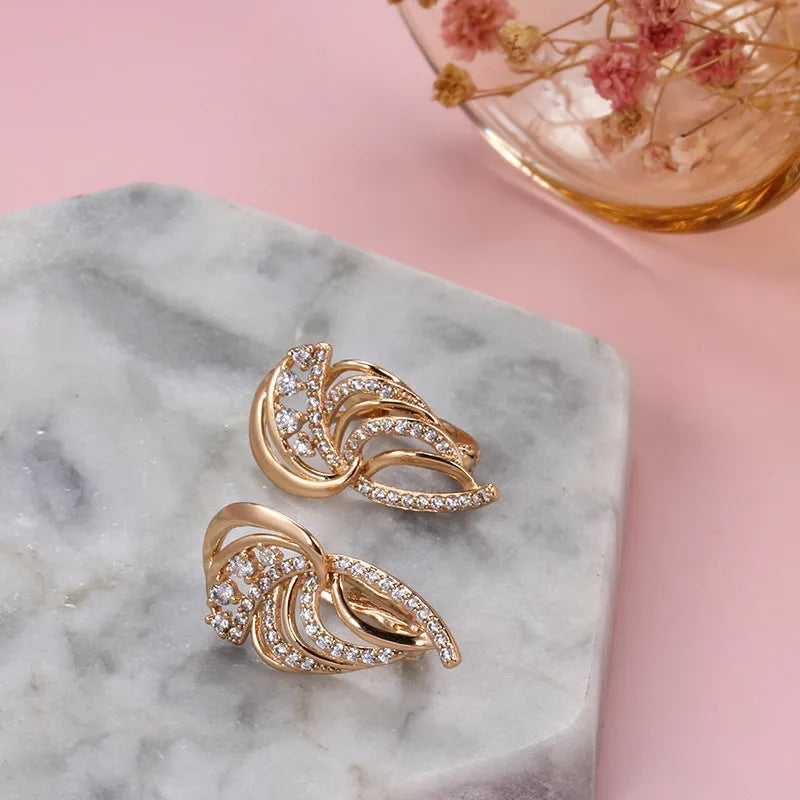 Women's geometric copper ear clip with micro-inlaid zircon wings and gold-plated artificial gemstone inlay