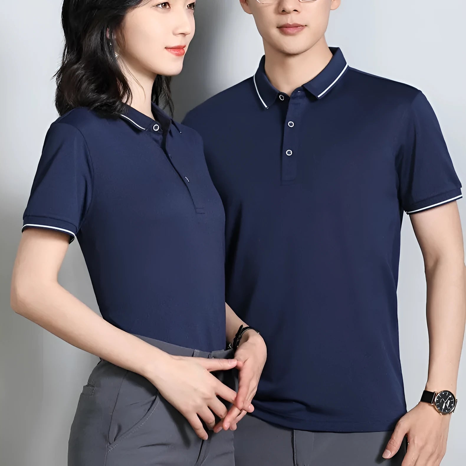 Short-sleeved asymmetric polo shirt for beauticians in pea green, shown on a hanger.