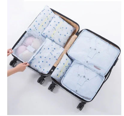 Premium waterproof travel packing cubes in various colors for organized packing and storage