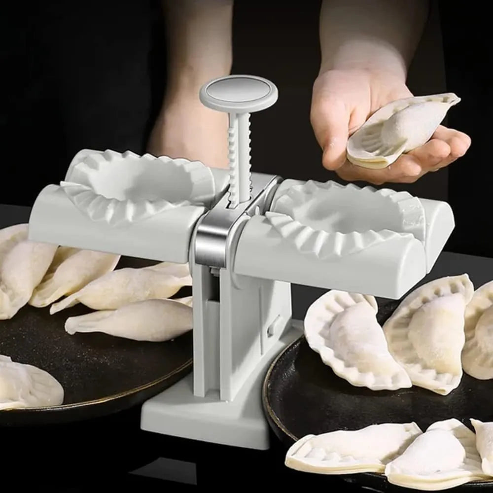 White double-head manual dumpling press with stainless steel mould and plastic handles