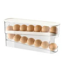 Clear plastic slide-out egg tray dispenser holding 12 eggs on refrigerator side door shelf