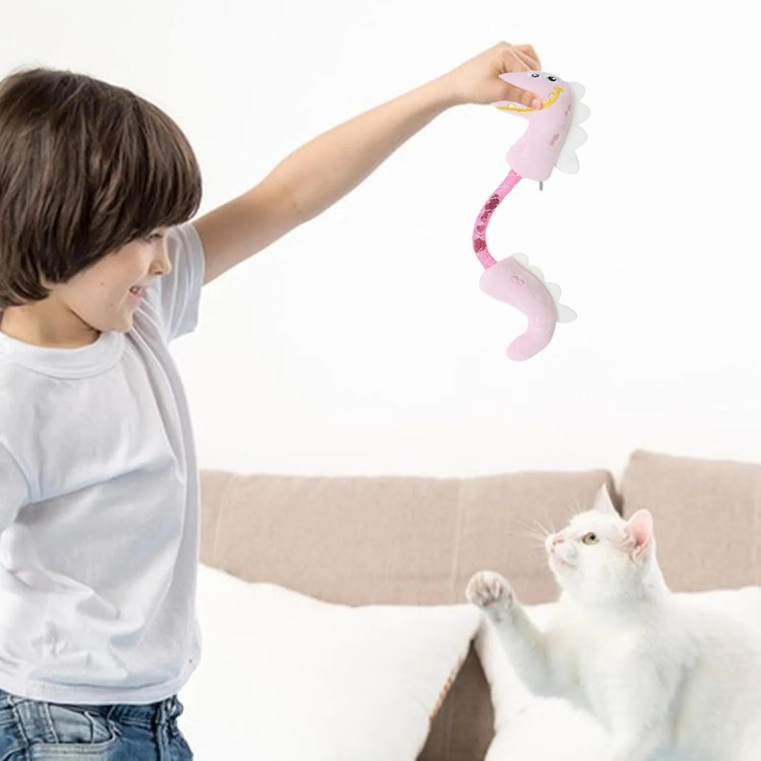 Set of four cat toys including plush, rope, and spring toys in pink, purple, and yellow colours