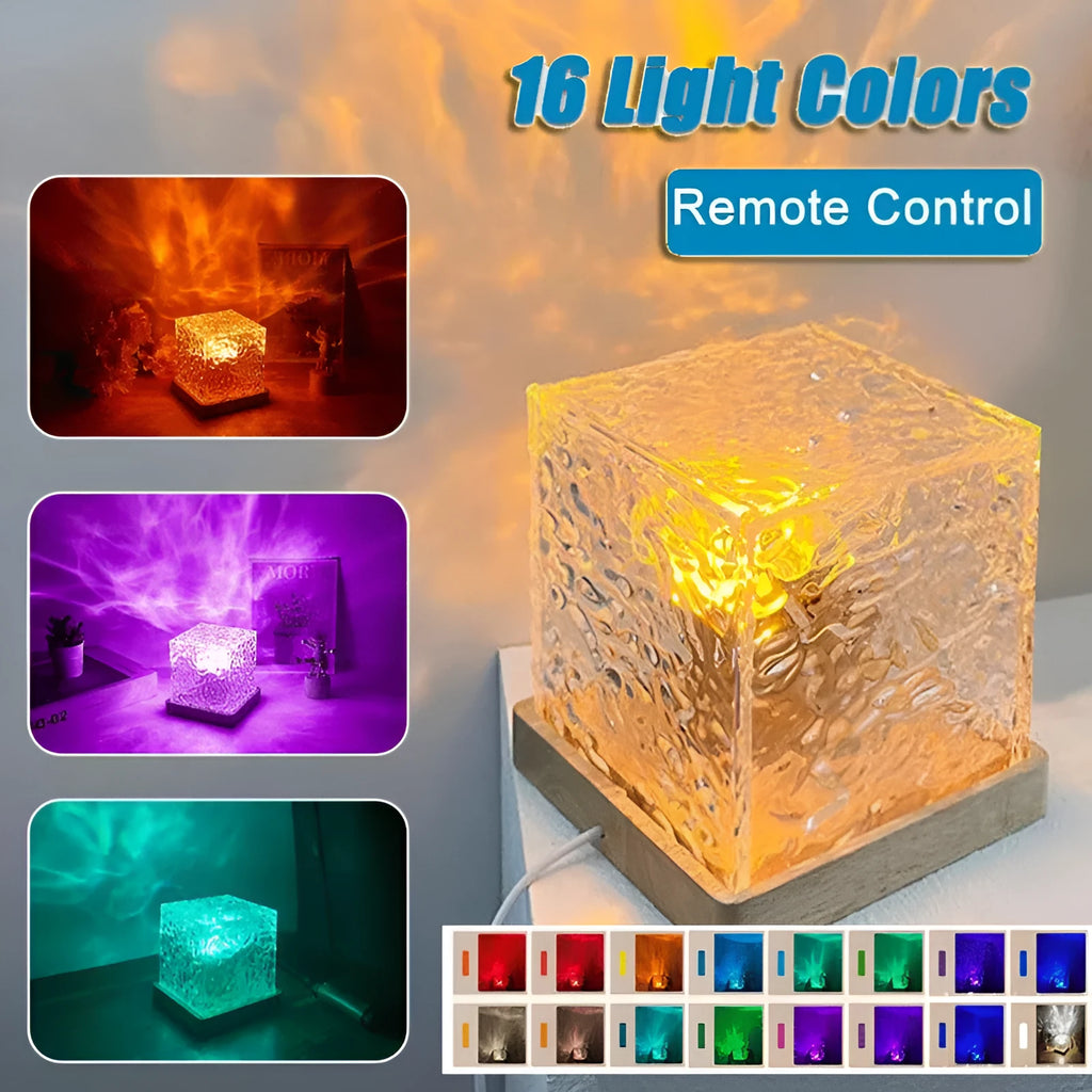 Square crystal LED table lamp projecting blue water ripple light patterns on a wall.