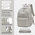 Off-white canvas student backpack with simple design, 45x33x17 cm dimensions