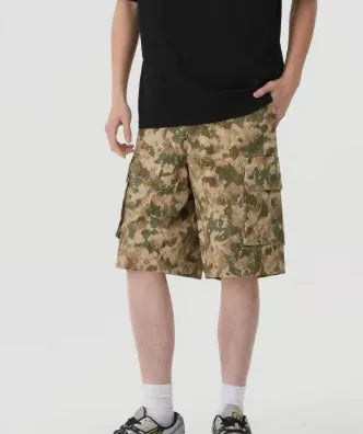 American retro workwear shorts in camouflage pattern with loose cropped fit