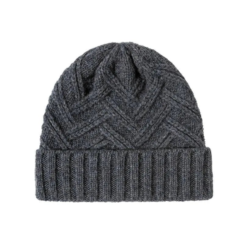 Wool knitted women's winter hat with dome crown and totem pattern in ivory white colour