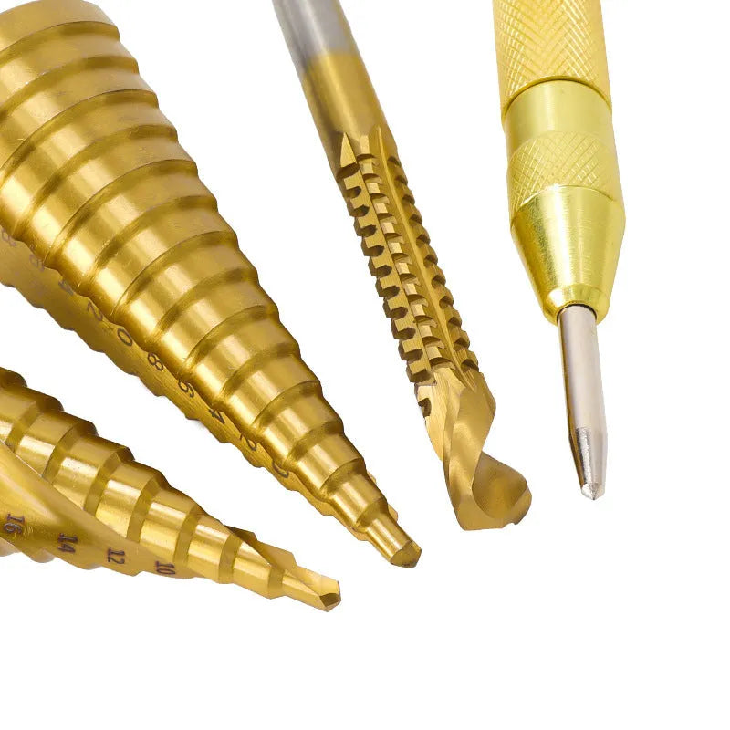 High speed steel cone step drill bit and centre punch set with numbered colour options on a workbench.