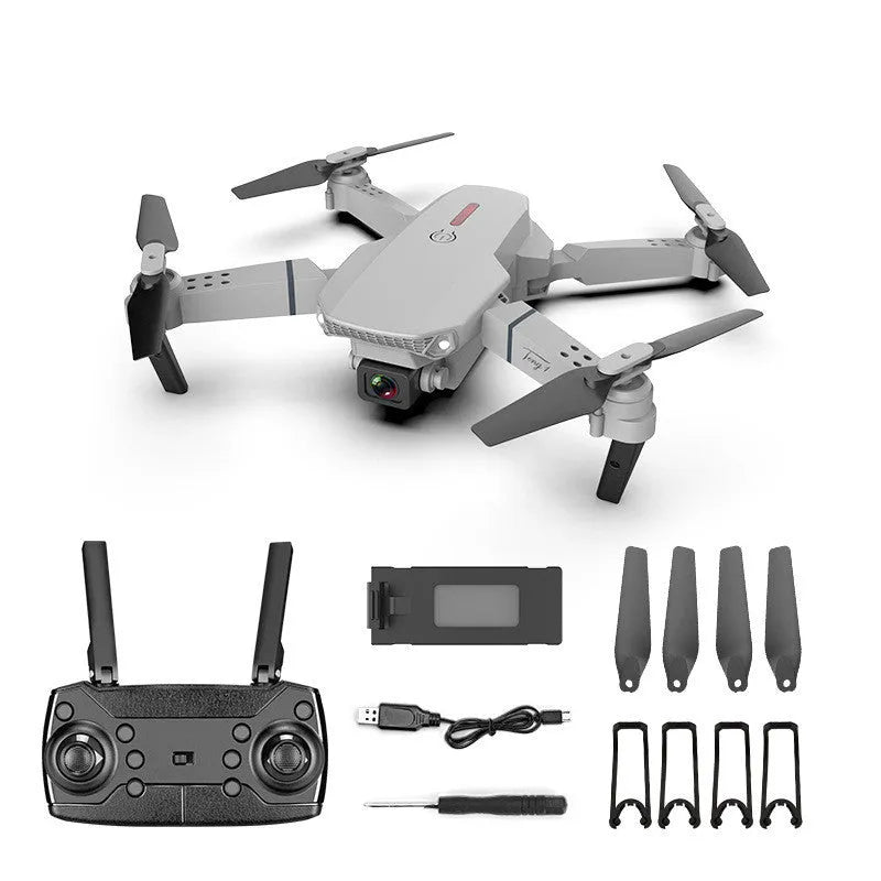 Grey foldable 4K dual camera aerial drone with remote controller and accessories