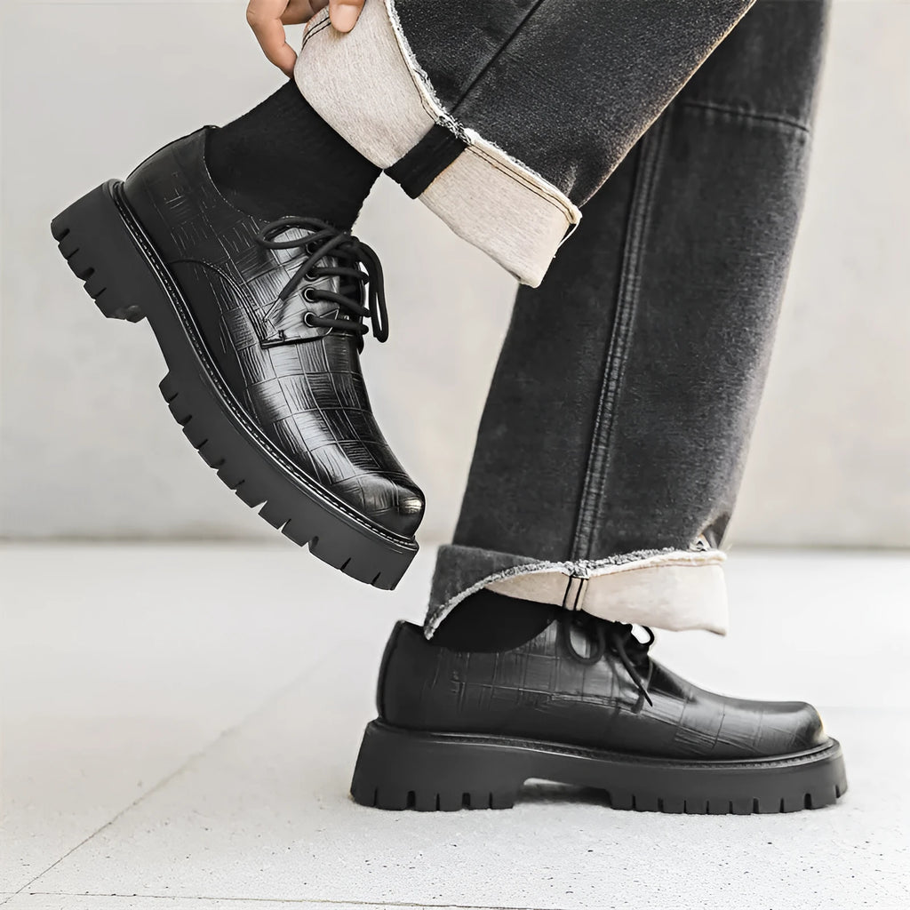 Black low top casual shoes with genuine leather upper, round toe, chunky heel and rubber sole.
