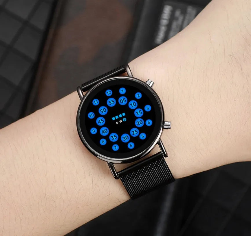 LED Ball electronic watch with round dial and stainless steel mesh strap on wrist