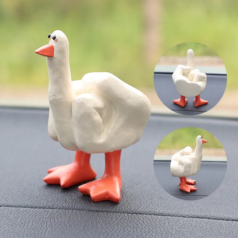 Creative middle finger duck cartoon resin ornament in beige, 50x77mm, on car centre console