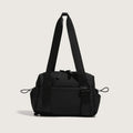 Large capacity nylon travel buggy bag in pink, blue, black, green or creamy white with double shoulder straps and zip compartments