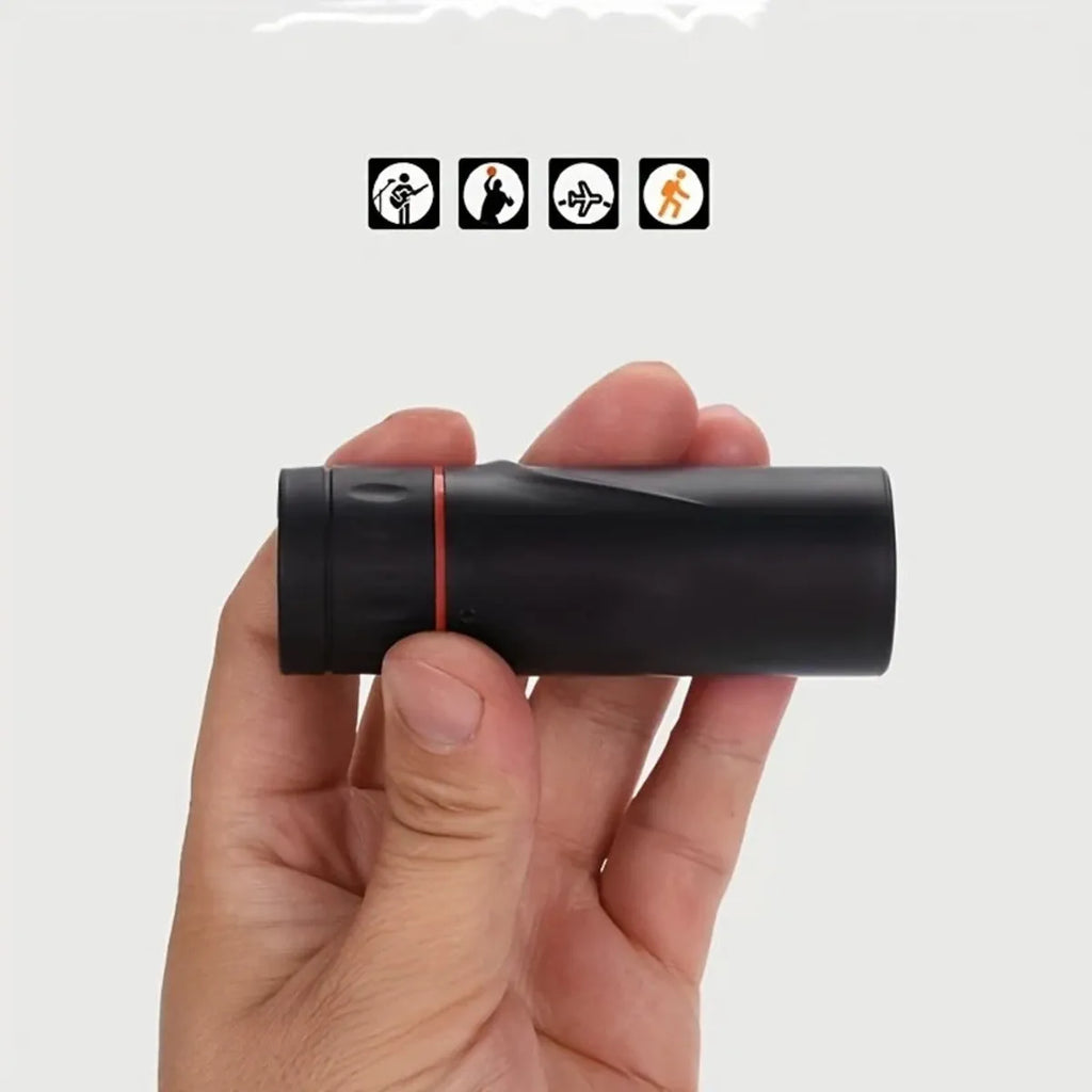 Black monocular telescope with rubber exterior and mobile phone attachment holder