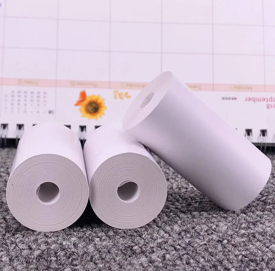PerPage Mini wireless portable thermal printer paper rolls in regular, sticker and label styles, multiple colours