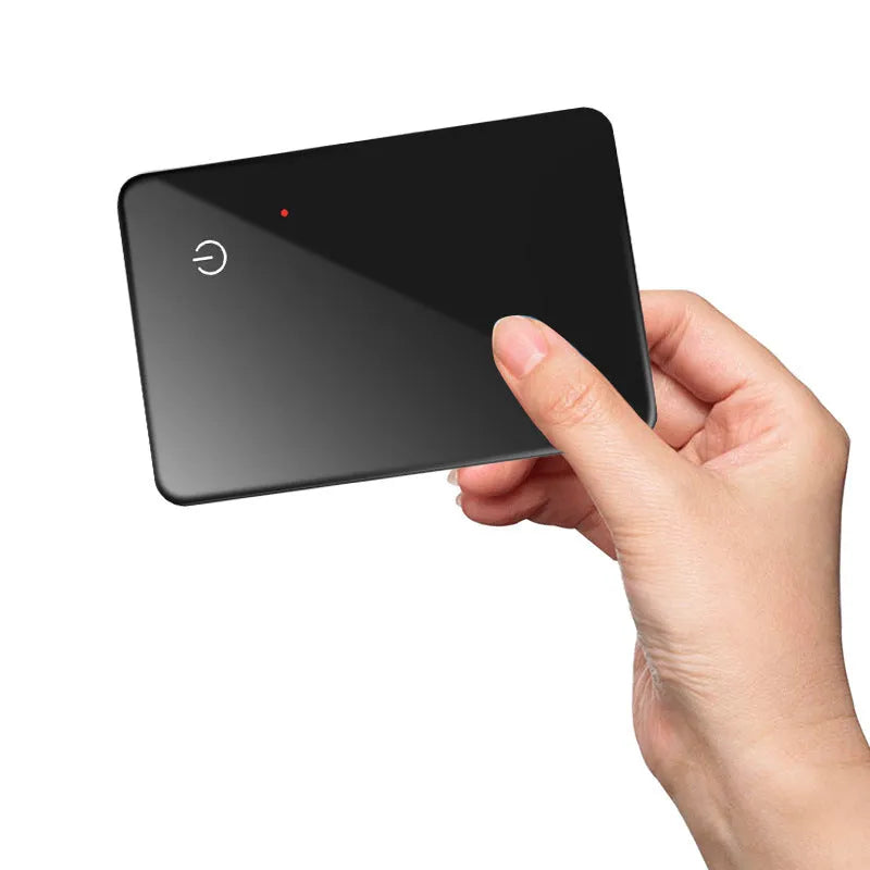 Black plastic pet tracking device with card shape, hanging hole, and wireless charging via NFC interface
