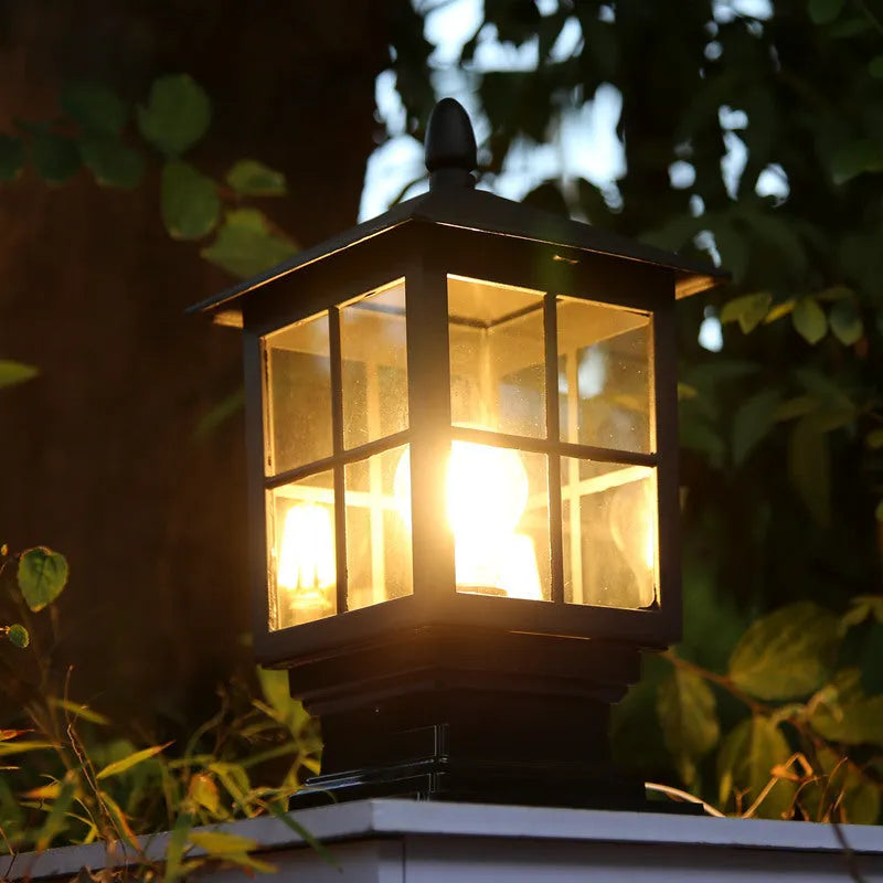 Black outdoor alloy pillar lamp on a brick wall, 180x345mm waterproof lighting fixture
