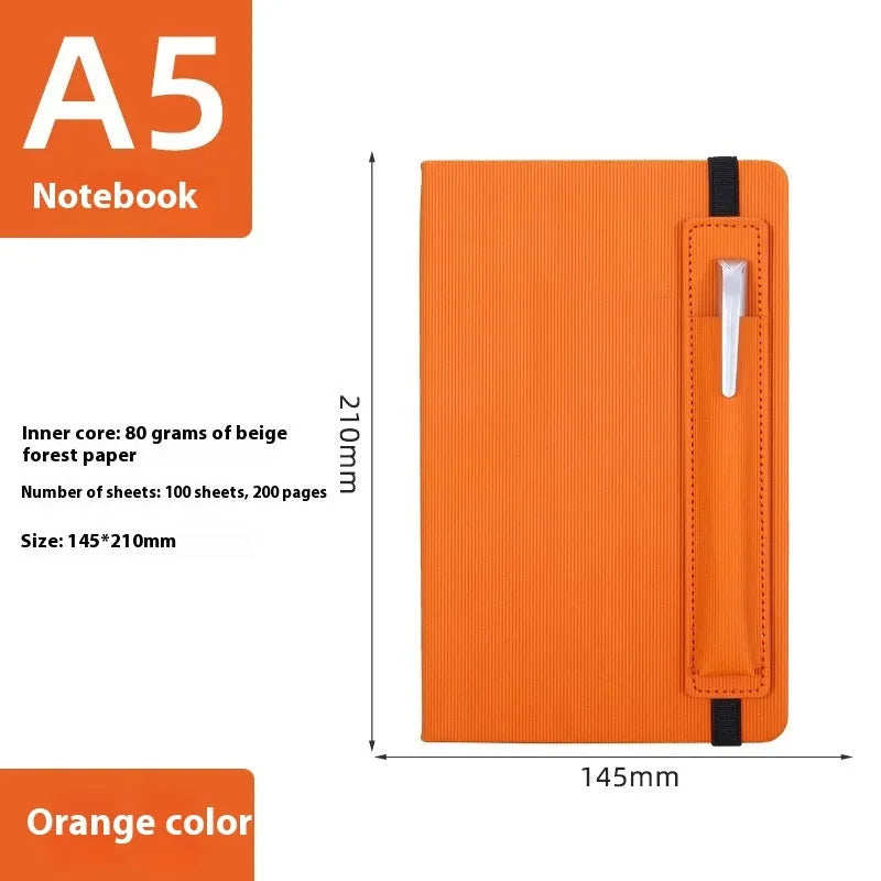 A5 faux leather notebook in blue with strap and pen insert, 200 pages, lying flat
