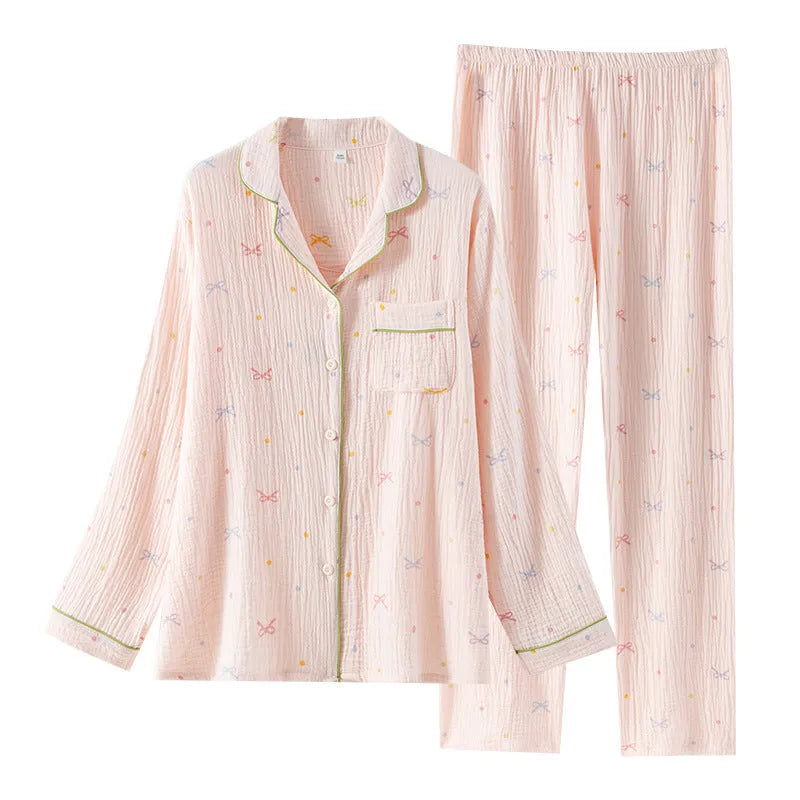 Women's beige cotton long-sleeved pajamas top and trousers set laid flat
