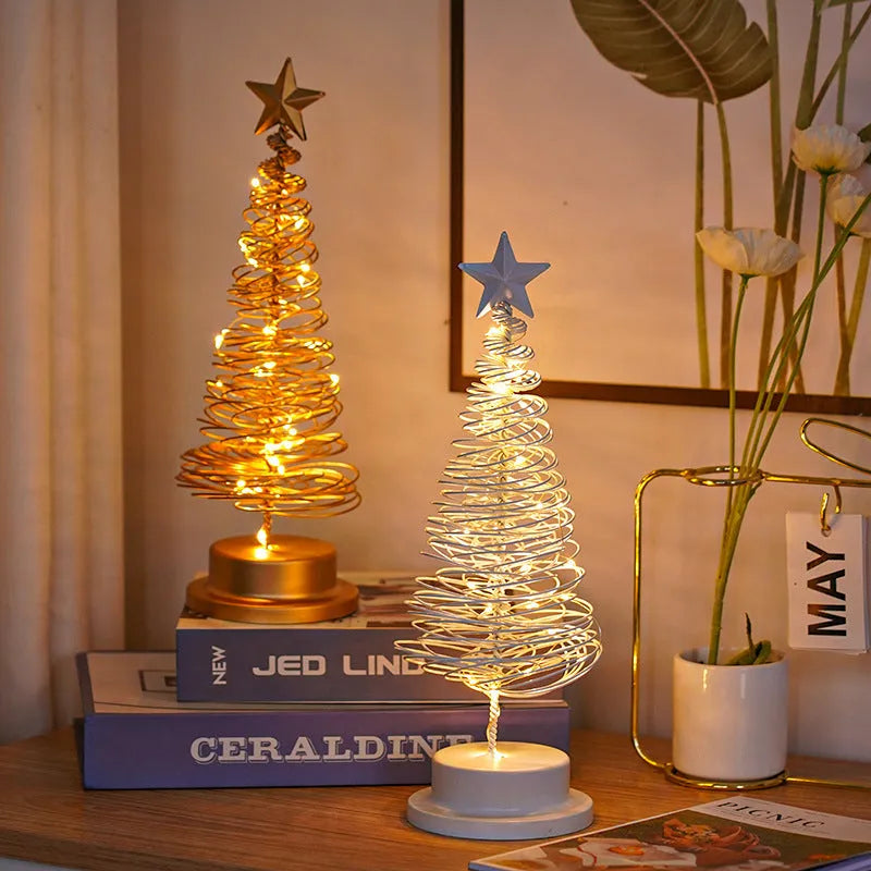 Metal spiral Christmas tree table lamp with warm white LED lights, 33cm tall.